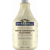 Ghirardelli envase frente grande de 2.47 kg con etiqueta visible y uso profesional