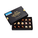 Godiva caja exterior dorada y negra mostrando lujo y facilidad para regalar