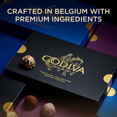 Godiva trufa en mano para comparar tamaño, ideal para compartir y degustar