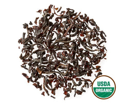 Golden Moon Tea hojas a granel resaltando mezcla de cuatro tés