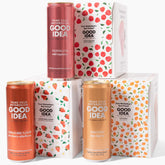 Good Idea pack frontal Triple Berry mostrando las 18 latas y beneficios sin azúcar