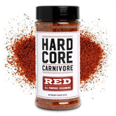 Hardcore Carnivore envase frontal mostrando etiqueta y tamaño 11oz, práctico para parrilla