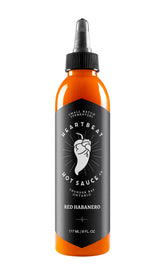 HEARTBEAT HOT SAUCE CO. botella frontal mostrando salsa roja y marca