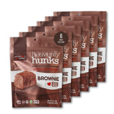 Heavenly Hunks empaque frontal mostrando brownies listos para llevar y conveniencia