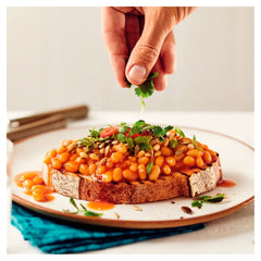 HEINZ alubias servidas sobre tostada mostrando conveniencia y sabor