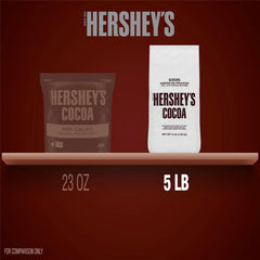HERSHEY'S bolsa junto a mano para mostrar escala y economía por peso