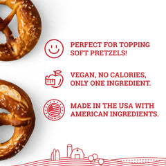 Hoosier Hill Farm mano espolvoreando sal sobre pretzel para sabor y textura
