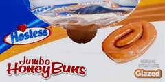 Hostess primer plano del glaseado brillante que aporta dulzura