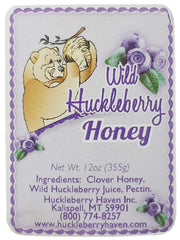 Huckleberry Haven frasco en mano para comparar tamaño y control porciones