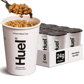 Huel cup frente mostrando el envase y la marca, conveniencia inmediata