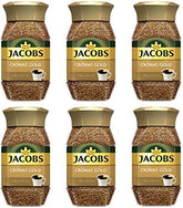 Jacobs Cronat Gold frasco frontal sobre mesa mostrando etiqueta y tamaño práctico
