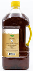 Jiva Organics vertiendo aceite en sartén para cocinar con estabilidad