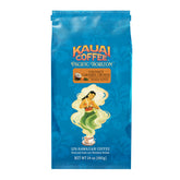 Kauai Coffee bolsa frontal mostrando Coconut Caramel Crunch y atractivo tropical