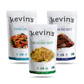 Kevin's Natural Foods pack frontal con tres frascos mostrando sabores y etiqueta clara