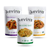 Kevin's Natural Foods frascos frontales del pack triple mostrando etiquetas claras y variedad