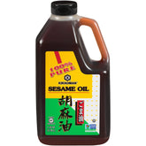 Kikkoman botella frontal mostrando aceite de sésamo, aporta sabor auténtico