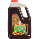 Kikkoman botella frontal mostrando etiqueta y beneficio de sabor auténtico
