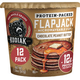 Kodiak Cakes empaque frontal pack de 12 mostrando la mezcla chocolate mantequilla de cacahuate y beneficio de porciones individuales