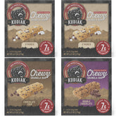 Kodiak Cakes pack frontal con cajas de S'mores, Chocolate Chip y Double Chocolate mostrando conveniencia