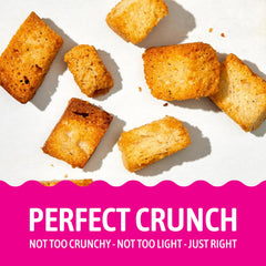 Kooshy Croutons sobre una ensalada verde mostrando cómo realzan sabor y textura