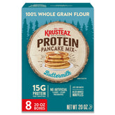 Krusteaz empaque frontal mostrando mezcla y beneficio de 15 g proteína