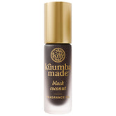 Kuumba Made roll-on Black Coconut frente mostrando diseño y portabilidad