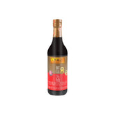 Lee Kum Kee frontal de la botella mostrando etiqueta y diseño, versátil en cocina