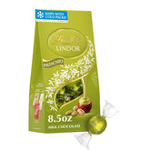 Lindt LINDOR pistachio vista frontal de la bolsa, presentación premium