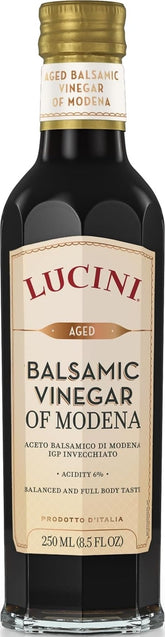 Lucini botella frontal mostrando etiqueta y volumen, realza platos