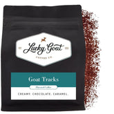 Lucky Goat empaque frontal mostrando sabor Goat Tracks y beneficio aroma intenso