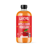 Lucy’s botella frontal 34oz mostrando vidrio y etiqueta, preserva sabor