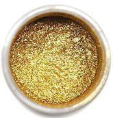 Luxe Cake polvo dorado frontal envase visible y brillo elegante
