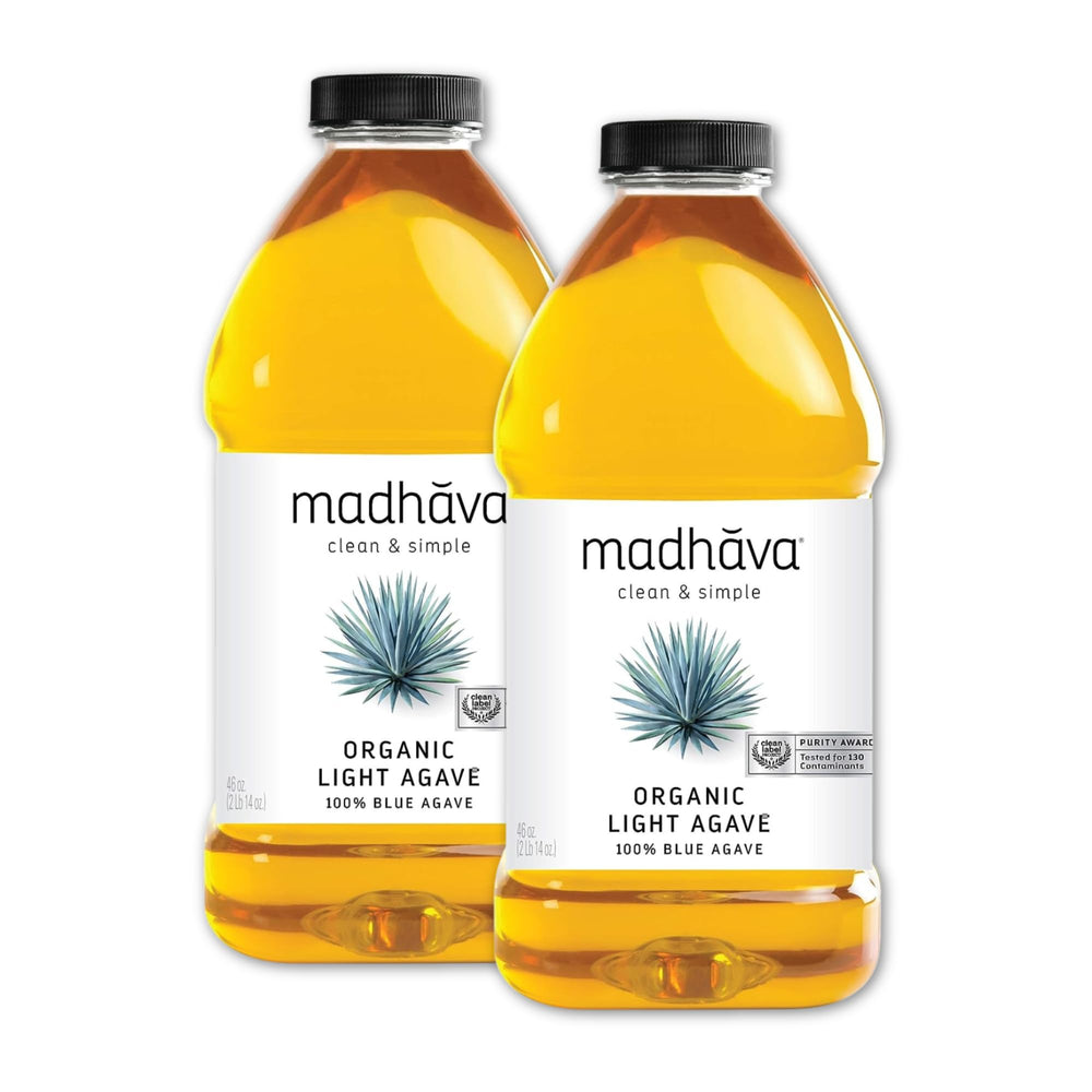 MADHAVA botella frontal mostrando etiqueta orgánica y beneficios
