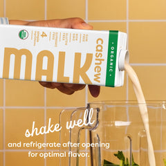 Vertido cremoso de MALK en vaso que muestra textura natural y sin gomas