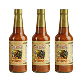Marie Sharp's imagen frontal de botella mostrando etiqueta y diseño, resalta autenticidad beliceña