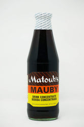 Matouk's botella frontal de 26 oz mostrando etiqueta y beneficios para organizar bebidas