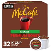 McCafé paquete frontal de 32 cápsulas K-Cup mostrando marca y tamaño, conveniencia inmediata