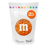 M&M'S WORLD frente de la bolsa naranja mantiene frescura y color