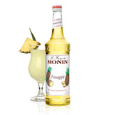 Monin frasco frontal de piña mostrando etiqueta y práctico vertido