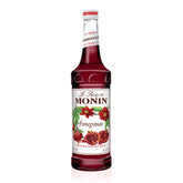 Monin botella de granada frente con color escarlata y atractivo visual