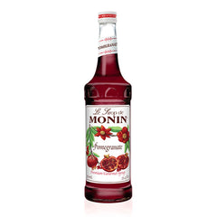 Monin botella de granada frente con color escarlata y atractivo visual