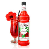 Monin mostrando la botella frontal con color vibrante y uso sencillo