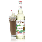 Monin jarabe menta frontal botella visible para uso en bebidas