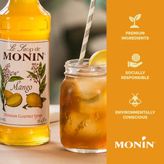 Monin botellas 48 oz junto a vaso para comparar tamaño y rendimiento