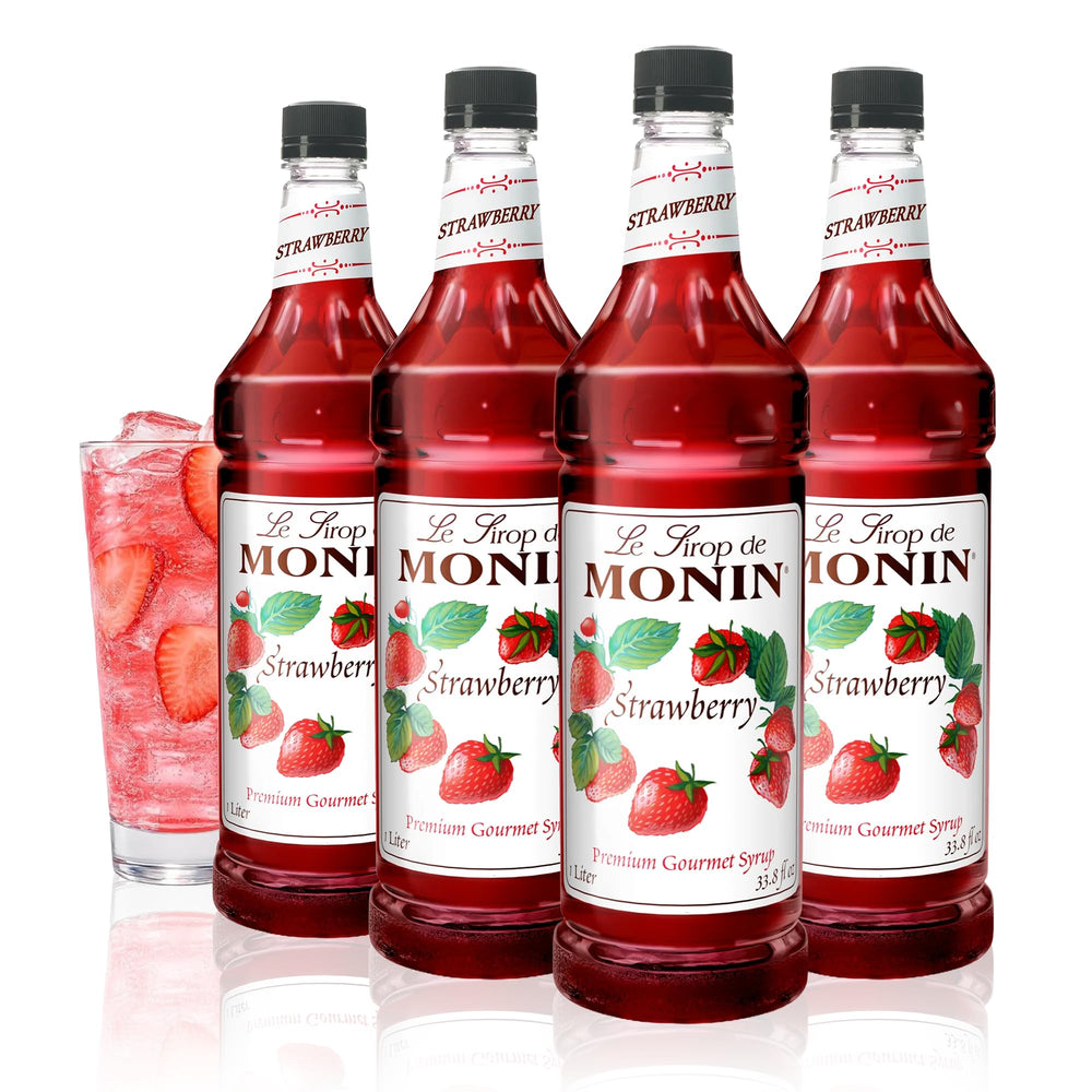 Monin botella de fresa frontal mostrando etiqueta clara y uso profesional