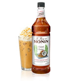 Monin jarabe toasted coconut frontal mostrando etiqueta y botella, aporta sabor consistente