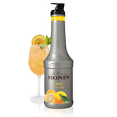Monin yuzu purée frontal botella brillante con color naranja intenso y uso versátil