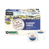 New England Coffee frente del empaque mostrando sabor Blueberry Cobbler y beneficios de tueste medio
