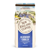 New England Coffee frente del empaque mostrando la marca y aroma atractivo