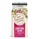 New England Coffee paquete frontal 18 oz mostrando la marca y facilidad de preparación